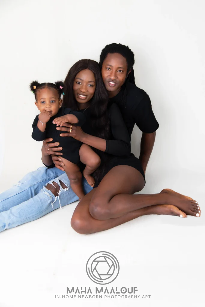 Parents with their baby during family photography at home in Lisbon